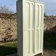 Restored vintage Parisian wardrobe from the 1930s in light green.
