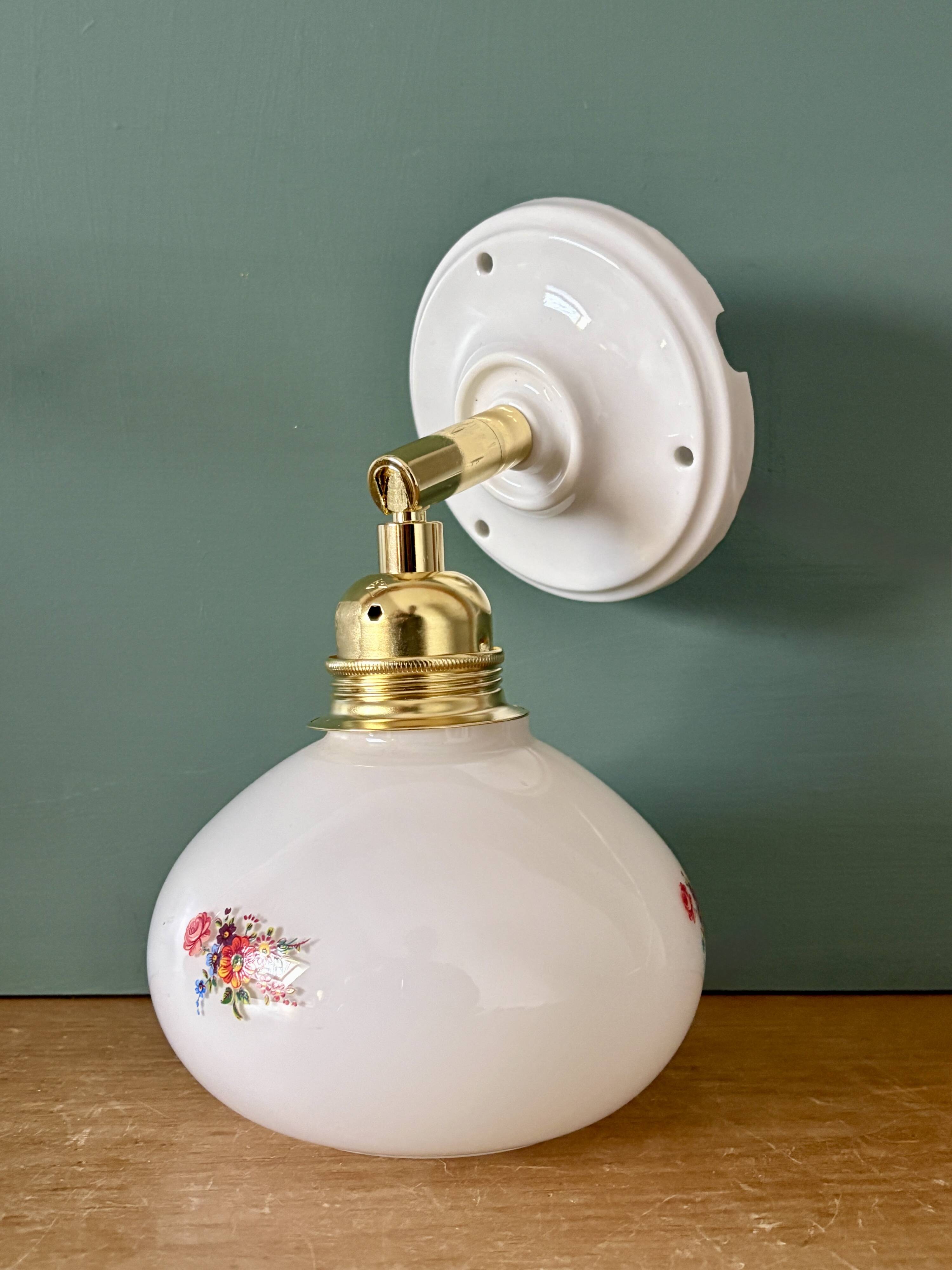 Vintage globe wall sconce in white opaline glass with floral decorations