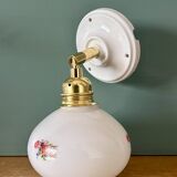 Vintage globe wall sconce in white opaline glass with floral decorations