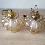 Two Globe chandeliers in molded glass in a beautiful amber color