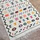 Handwoven Berber kilim rug: small Moroccan decorative rug.