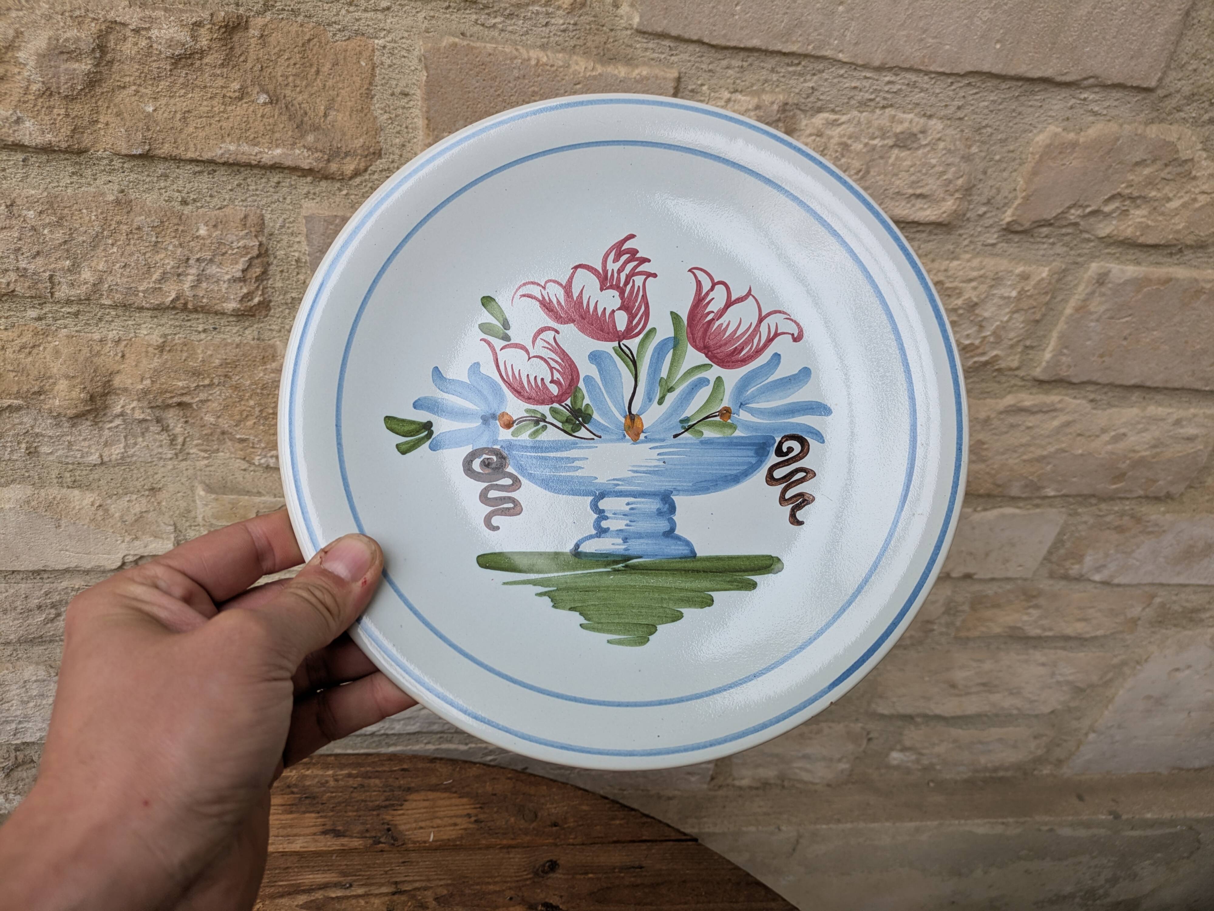 Plate with hand-painted flower bouquet on light blue background 25cm
