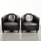 Set of two black vintage cowhide aviator design armchairs