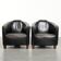 Set of two black vintage cowhide aviator design armchairs