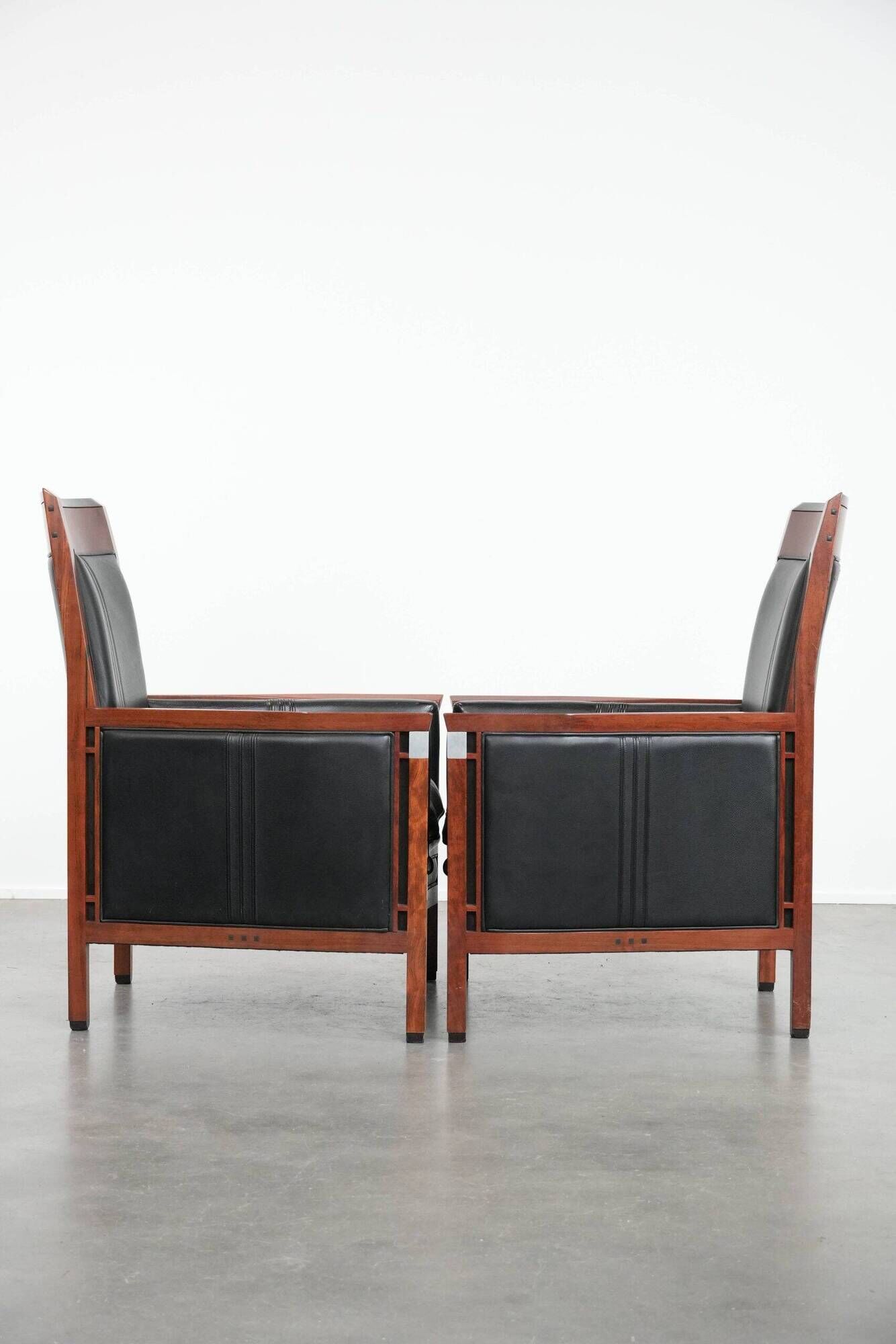 Beautiful set of 2 black cow leather Art Deco design armchairs with high back