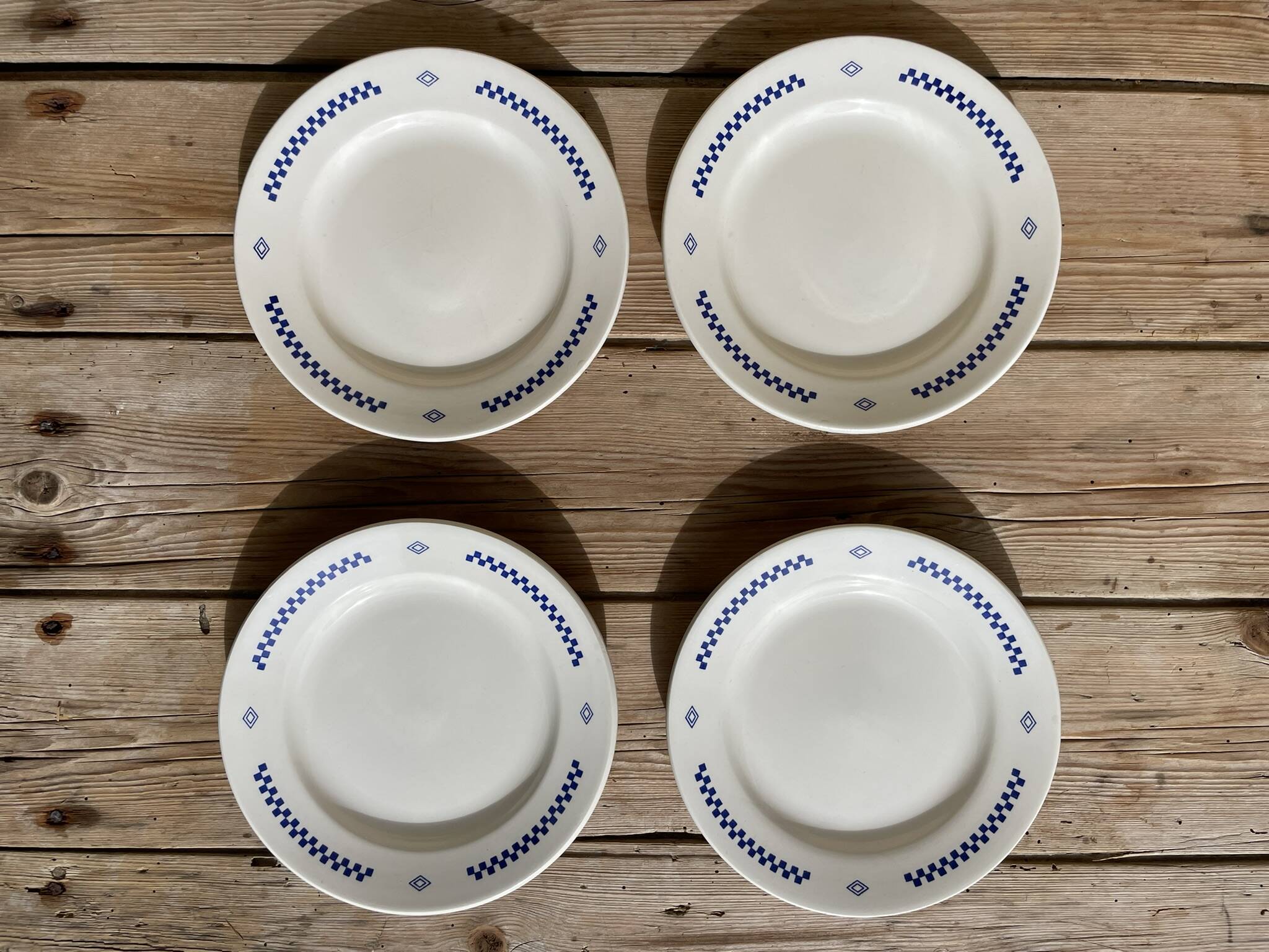 Set of 4 small vintage plates