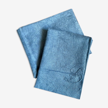 Set of two old blue embroidered monogram damask cotton towels