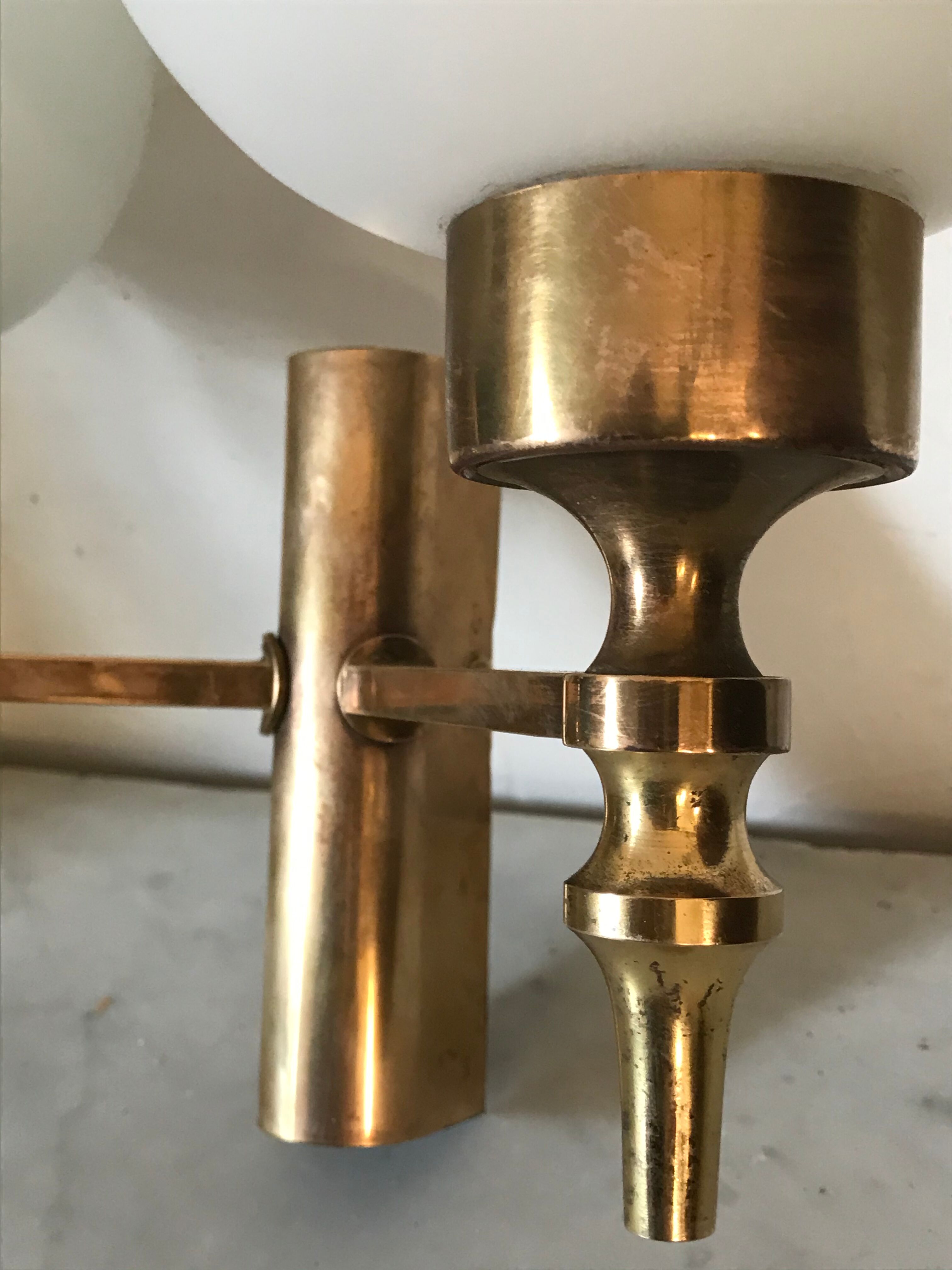 Double brass and opaline wall light