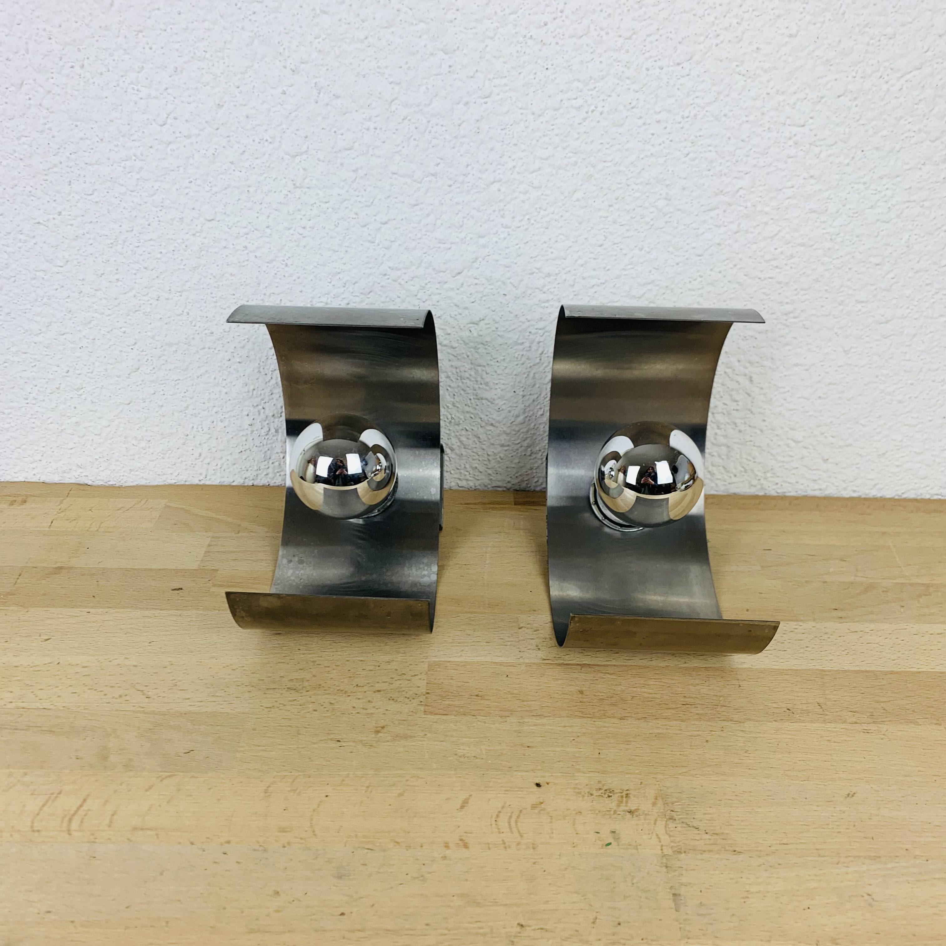 Pair of 70's brushed aluminum space age wall lights