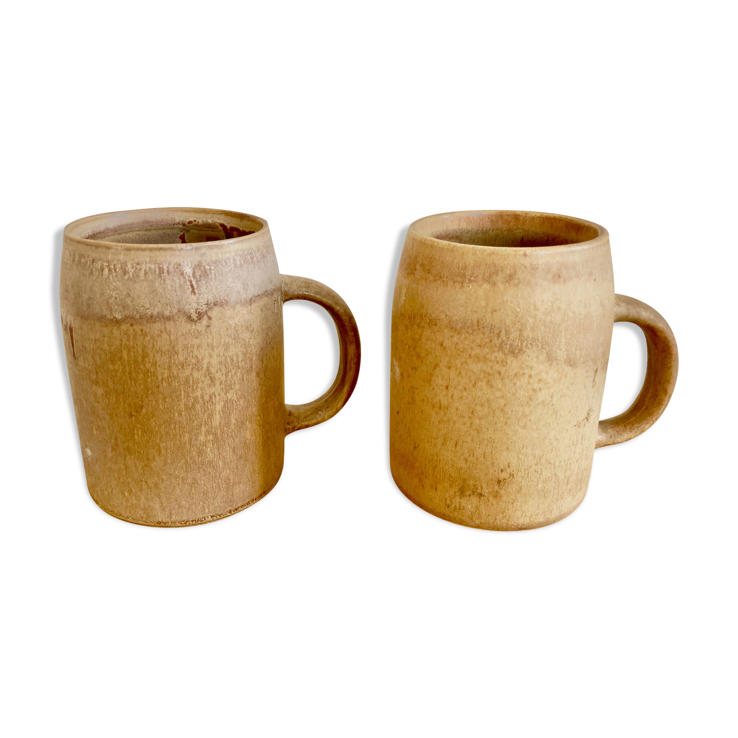 Duo of sandstone mugs