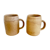 Duo of sandstone mugs