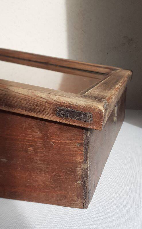Old sloping pine display case