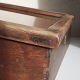 Old sloping pine display case