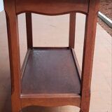 Wooden side table on casters