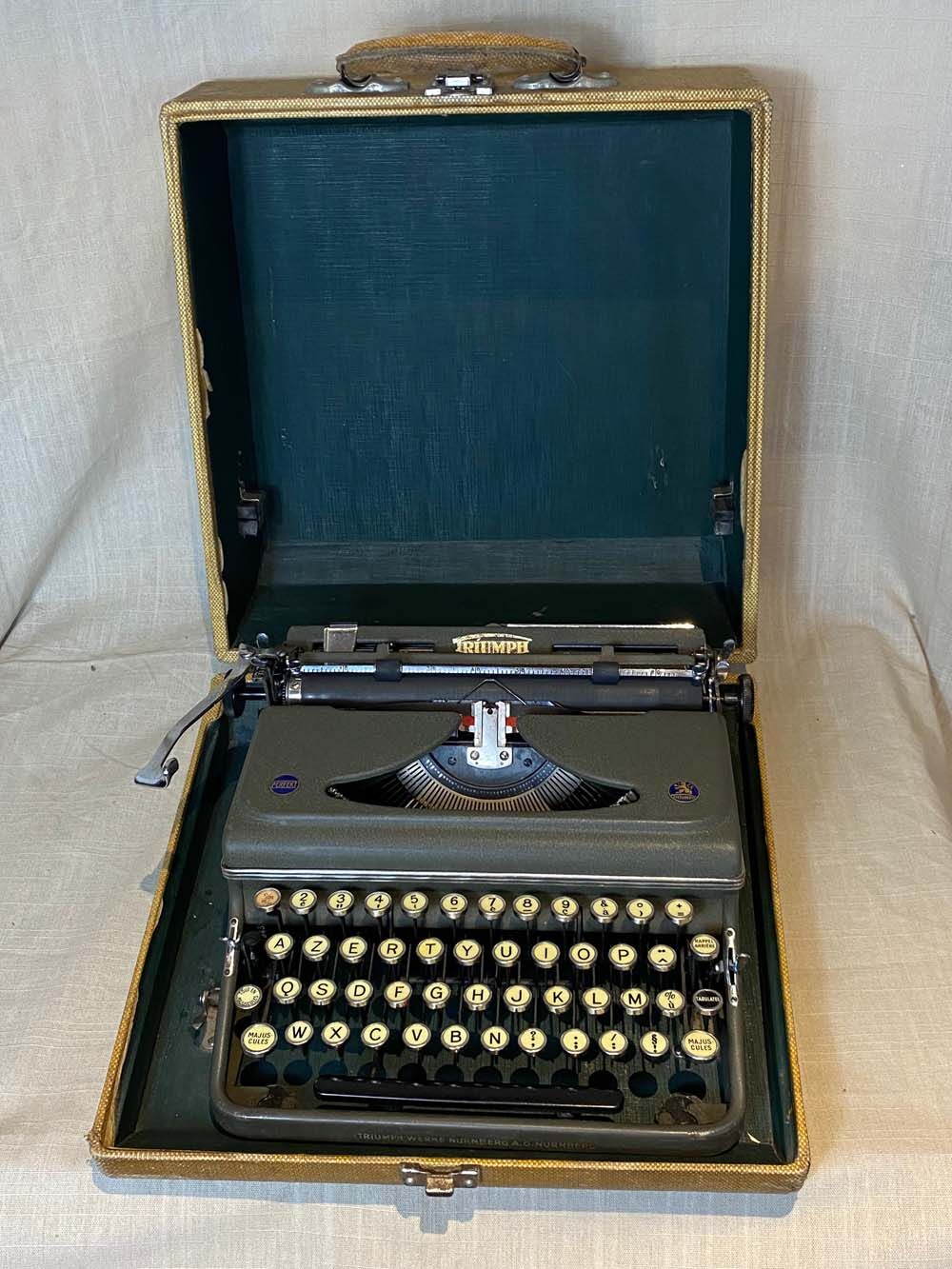 Triumph perfekt typewriter with its transport box.