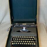 Triumph perfekt typewriter with its transport box.