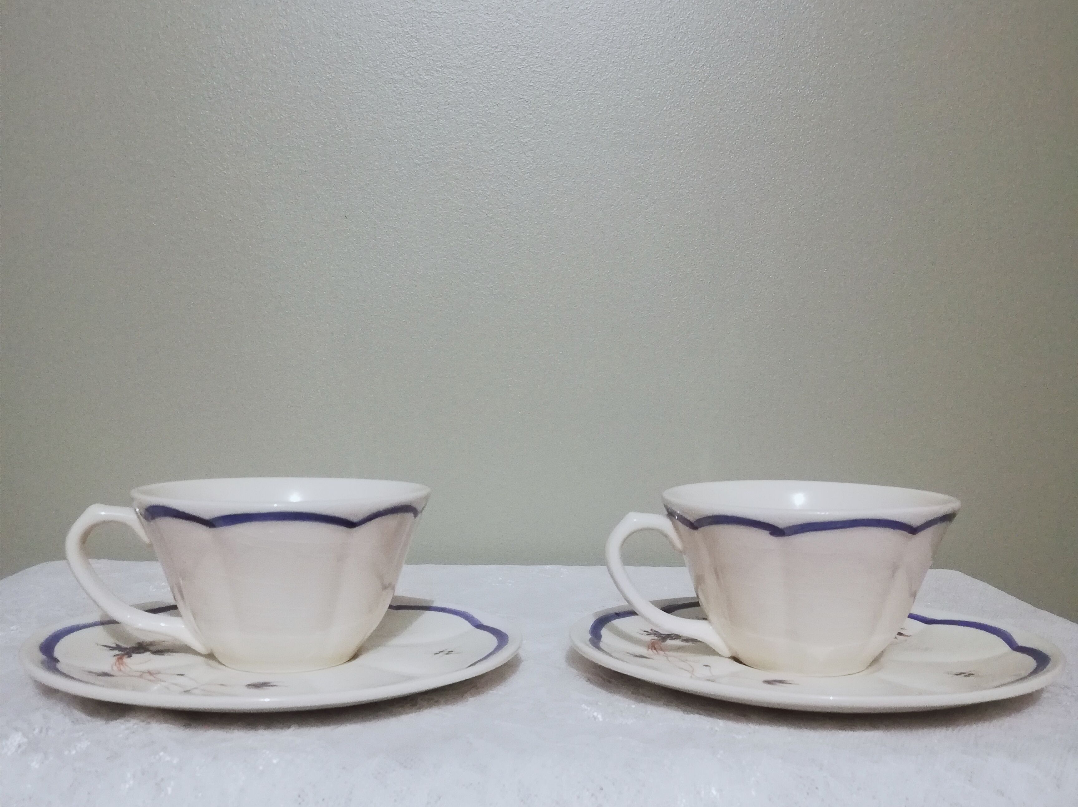 Two ceramic cups by Grignan signed Peguet