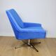 Vintage swivel armchair from DDR blue cornflower velvet from the Jade series