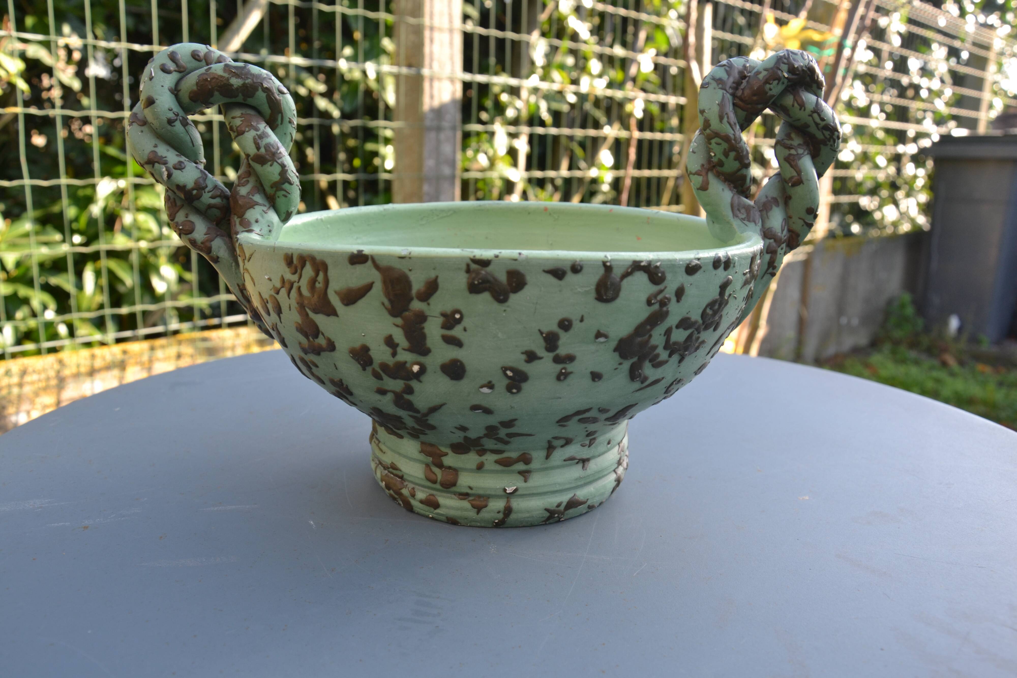 Antique cup with handles