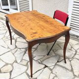 Solid wood table with curved legs