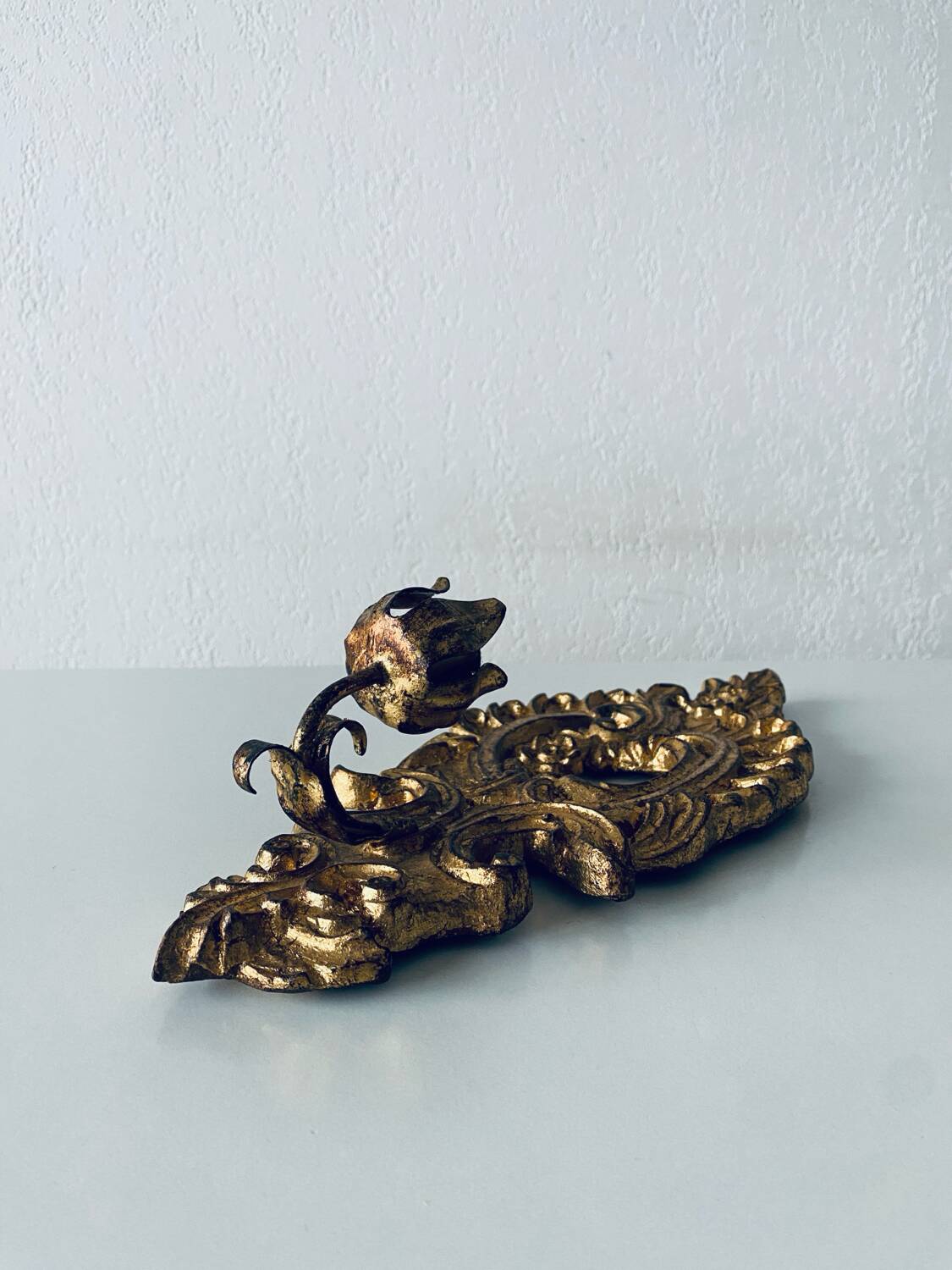 Gold wall candle holder
