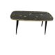Table basse vintage en formica noir et or
