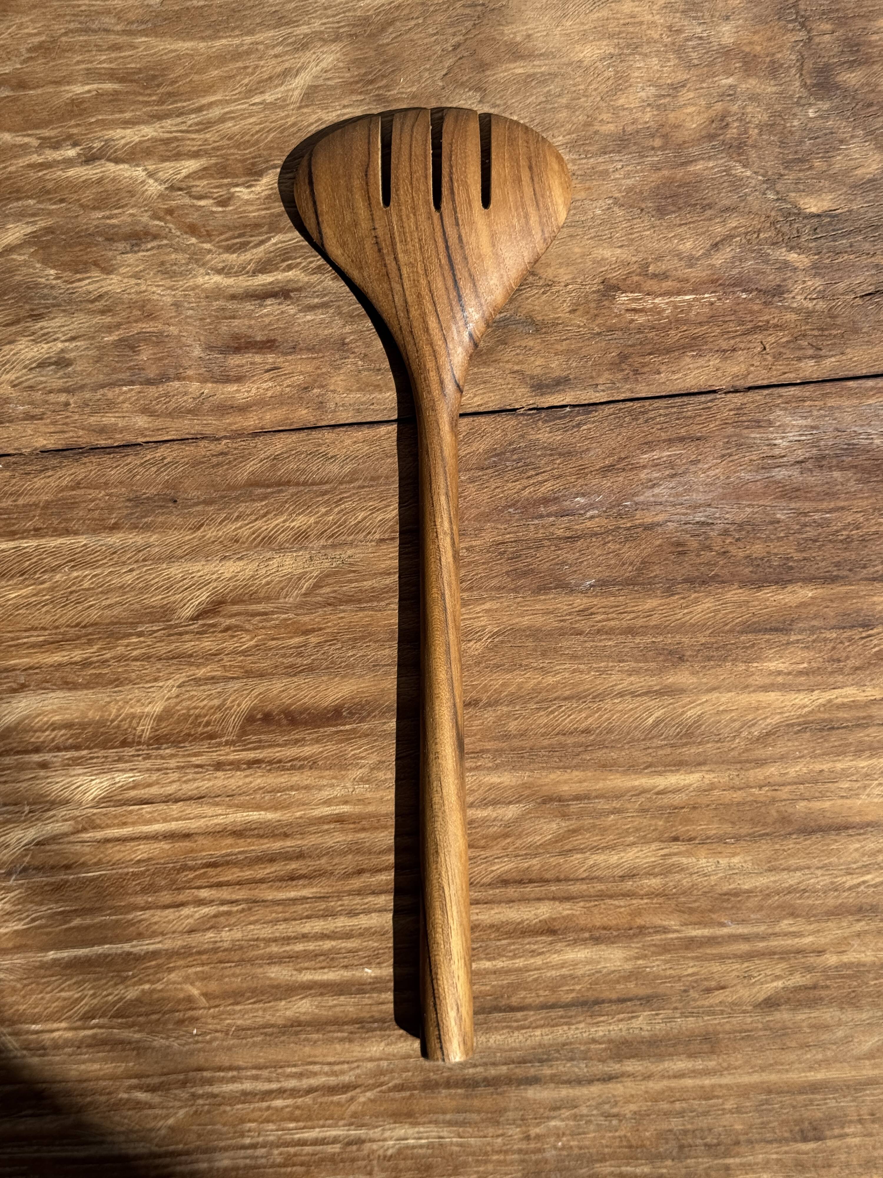 Salad server or large oval split teak spoon. L18 D8.5
