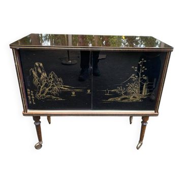 Illuminated bar cabinet Hollywood Regency black and gold 1970