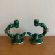 Pair of green and gold ceramic candlesticks