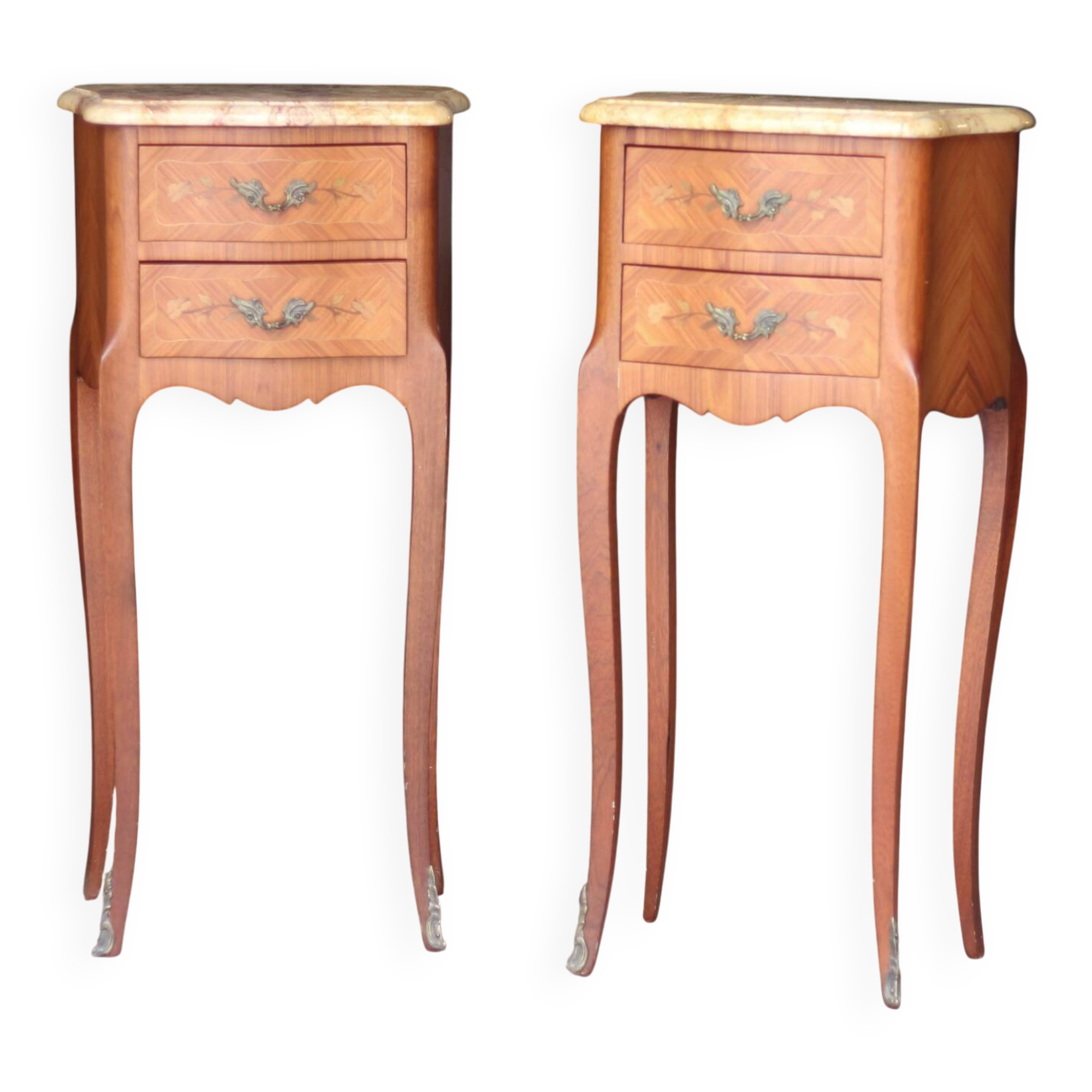 Paire de chevêts de style en placage de bois de rose.