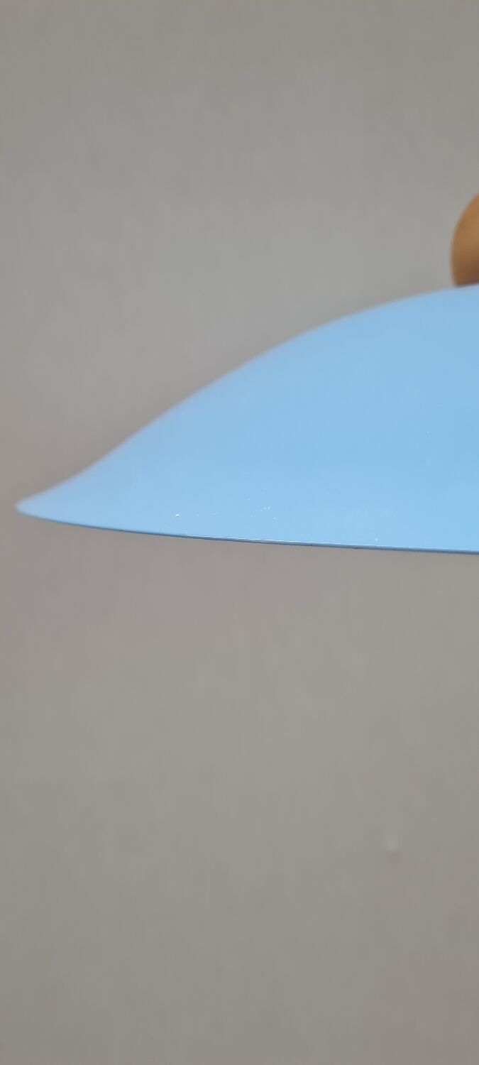 Suspension in enamelled sheet metal and wood