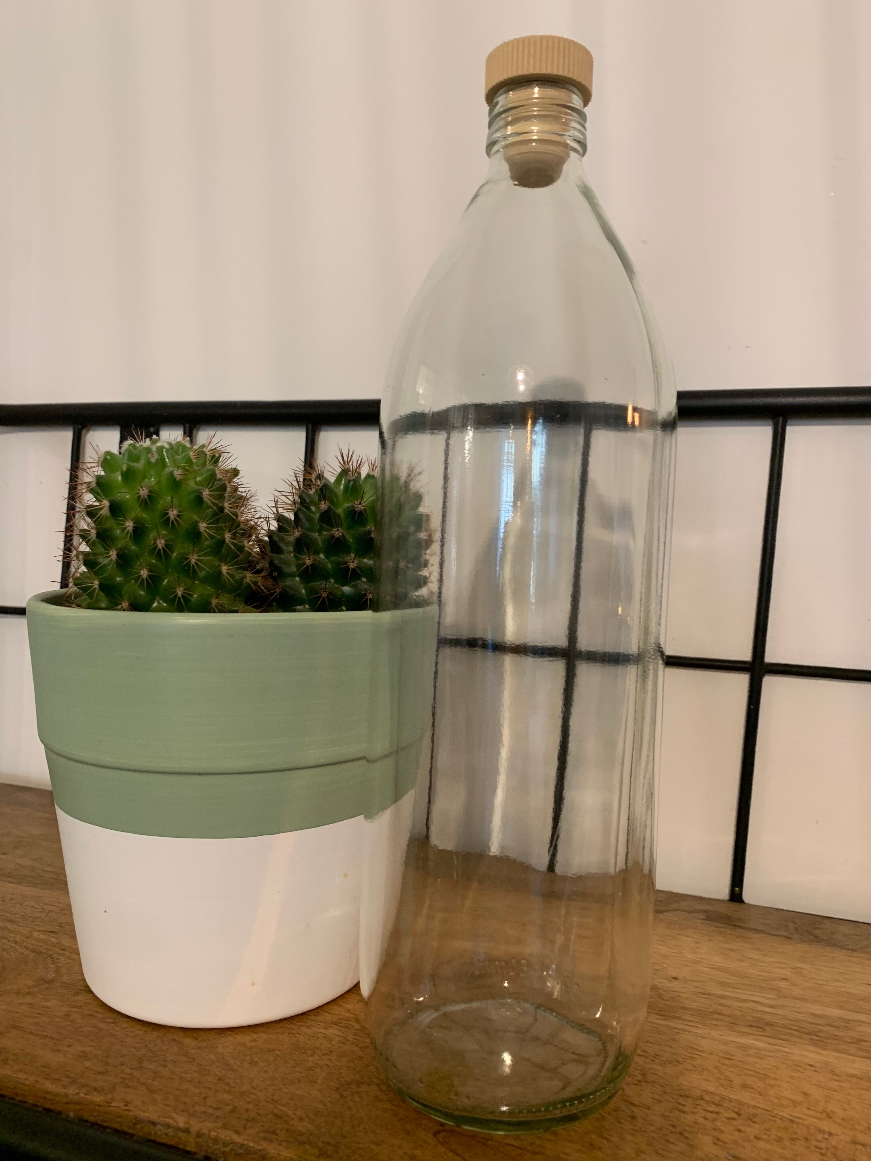 Antique glass bottle with a capacity of 1 litre and its beige cap - in very good condition!