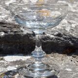 9 old champagne glasses in flat-waisted blown glass