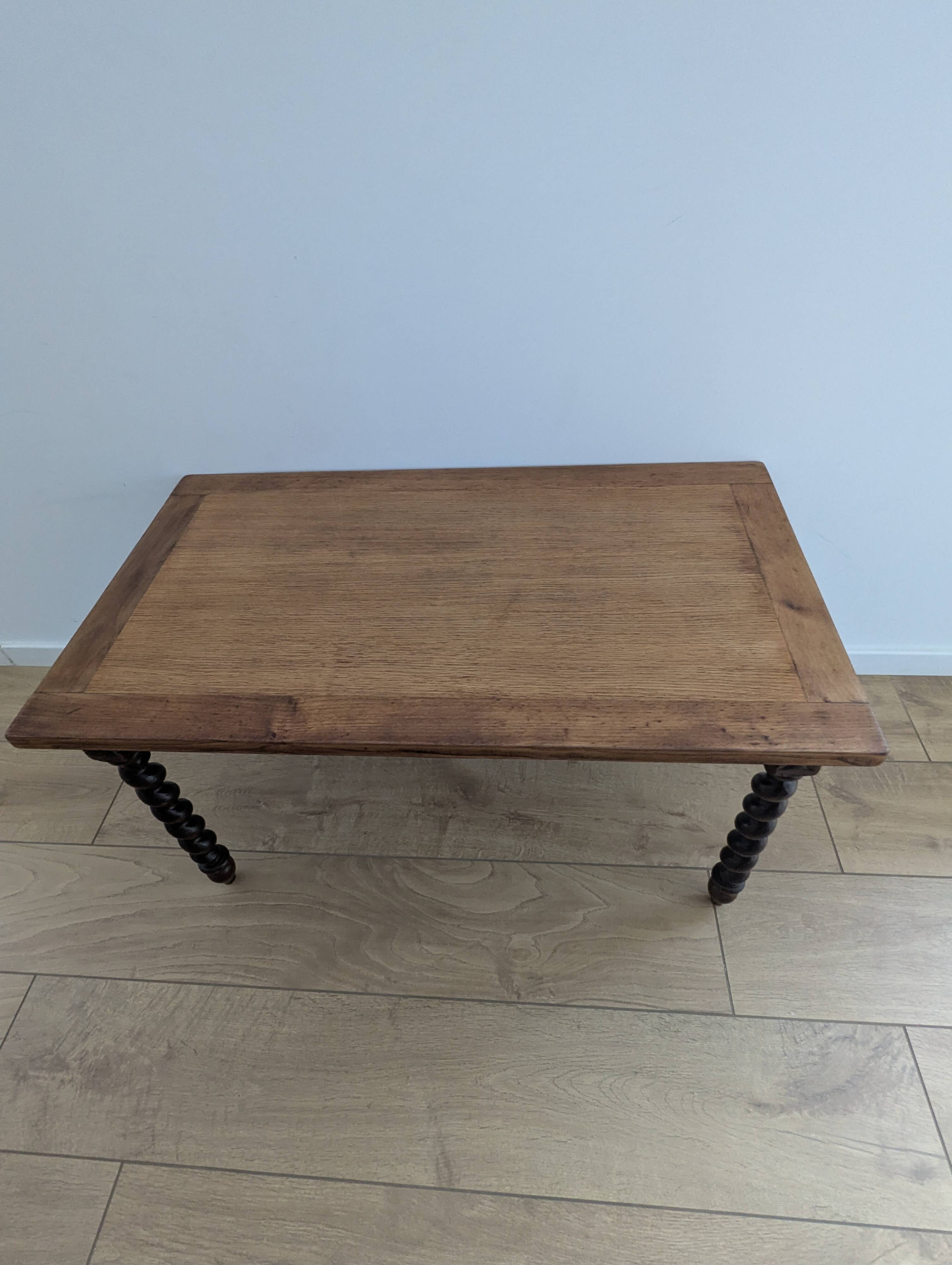 Solid wood coffee table with carved twisted legs