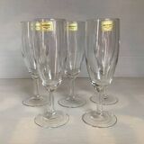 Five Luminarc champagne flutes