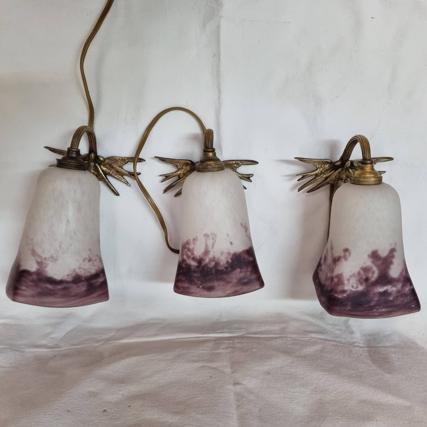 Glass paste wall light, bronze swallows