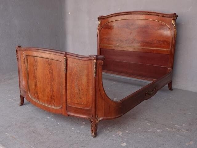 Golden bronze Louis XVI style mahogany bed