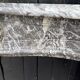 Louis XV fireplace in grey Saint Anne marble, 18th century.
