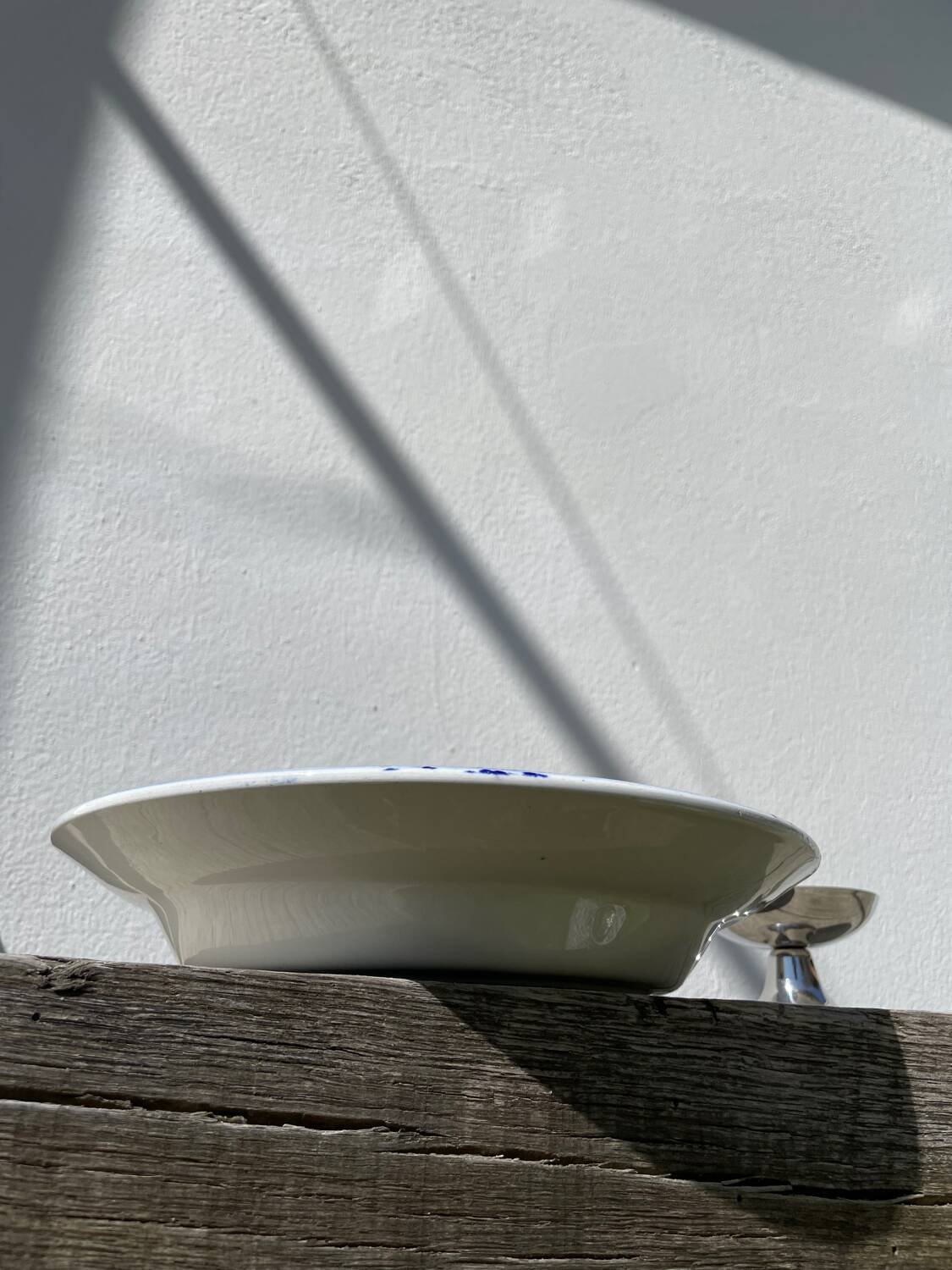 Round hollow ceramic dish with Saint Amand flower