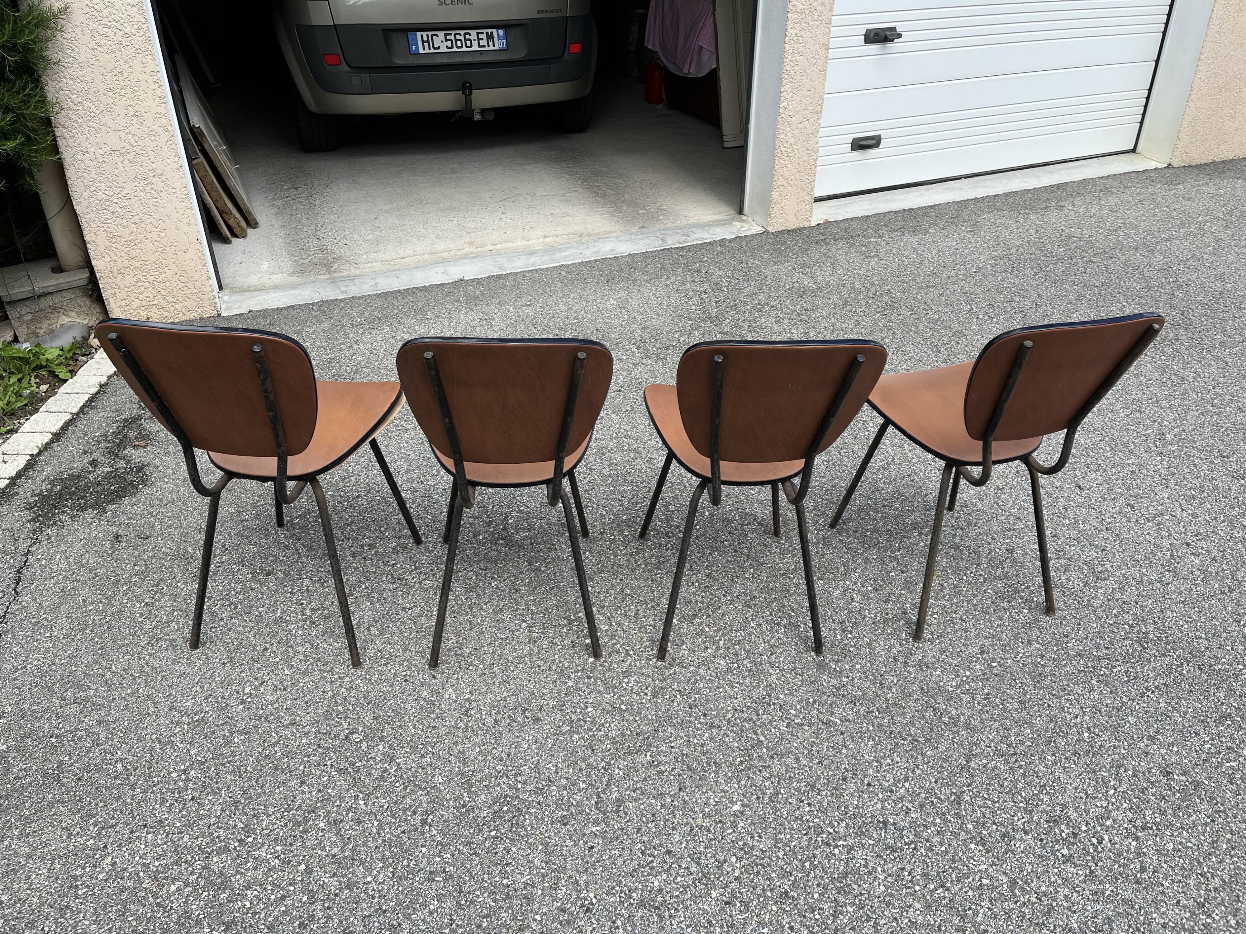 4 vintage brown faux leather chairs