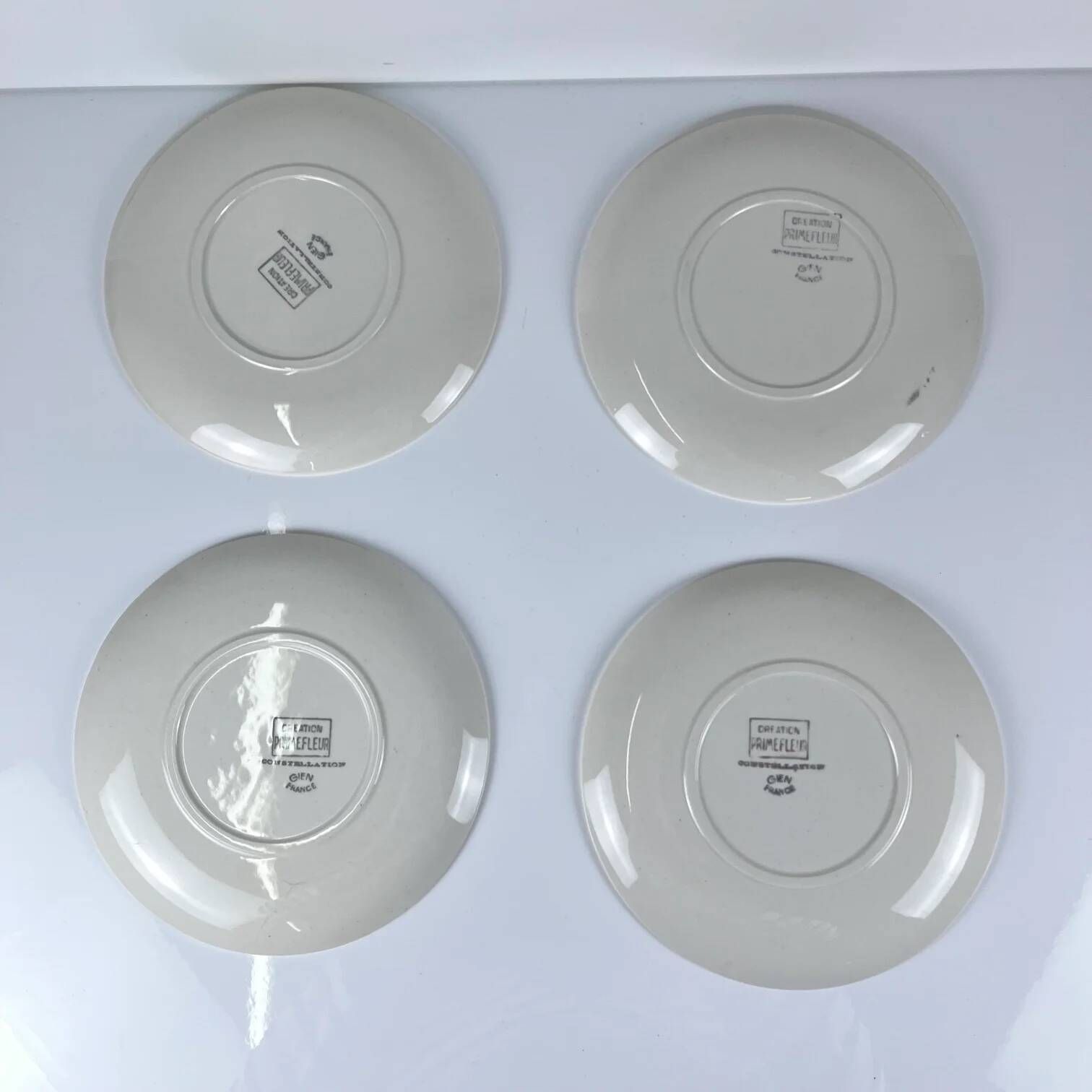 Set of 4 dessert plates GIEN, Primefleur creation, model "Constellation", 1950.