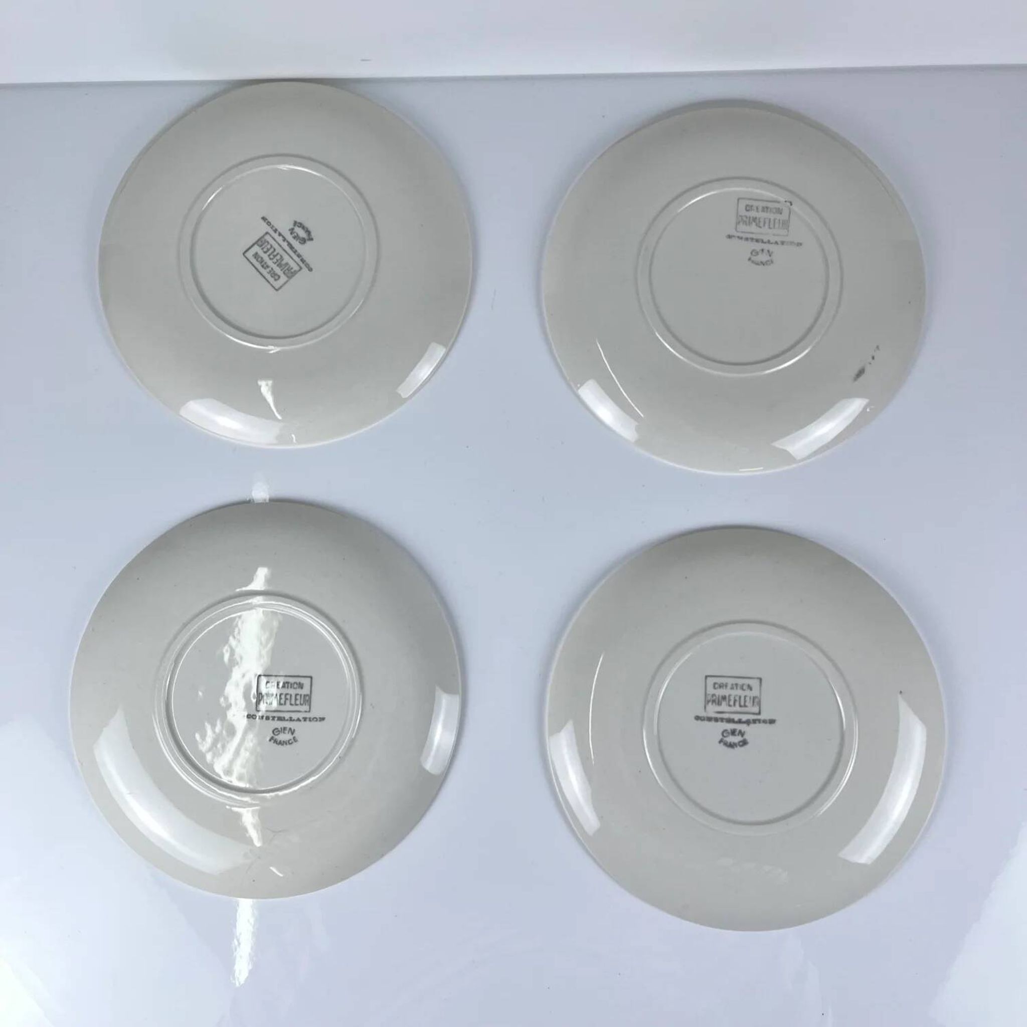 4 assiettes à dessert Gien, création Primefleur, modèle "Constellation", 1950