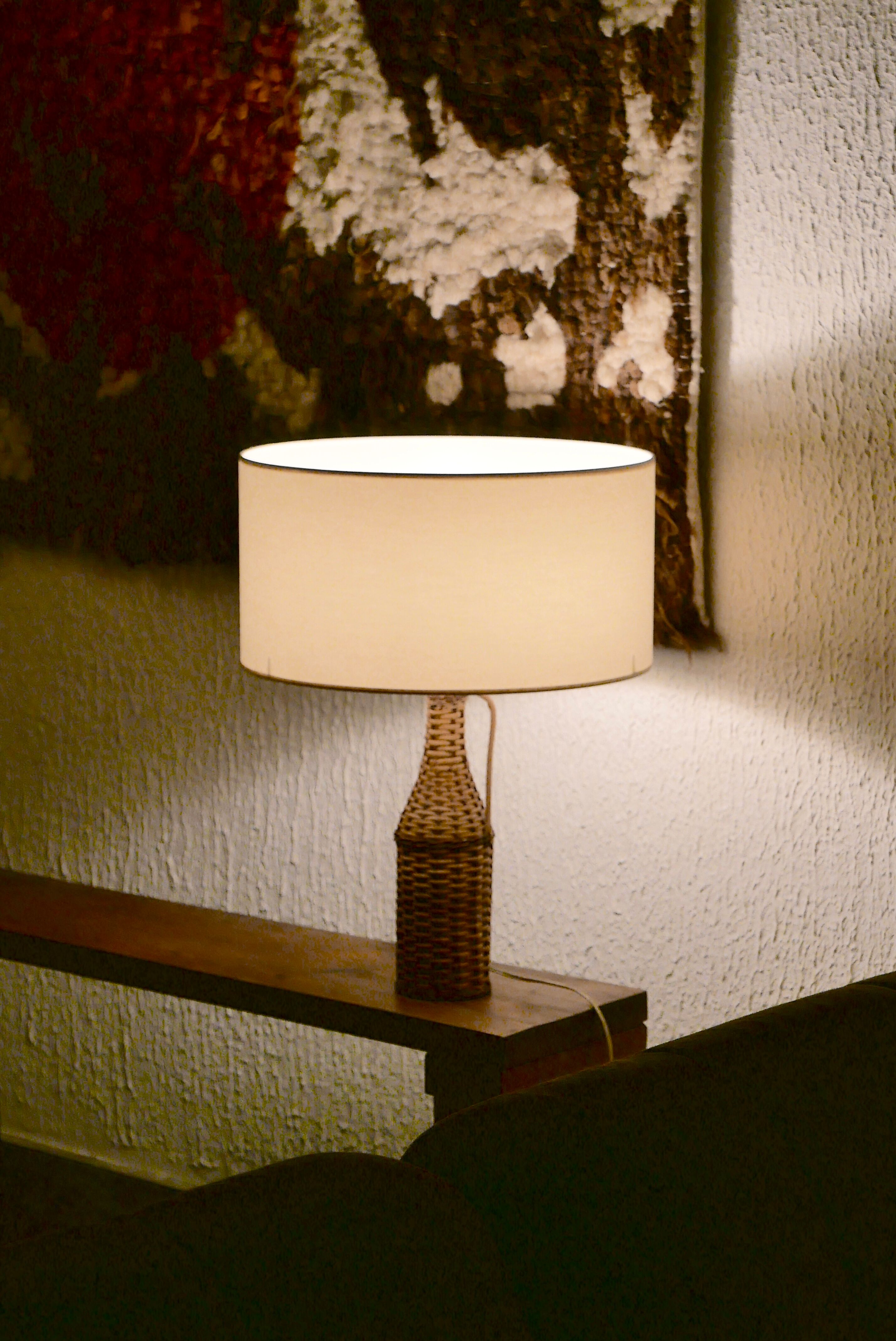 bottle lamp covered with wicker, white drum lampshade, 70s