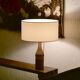 bottle lamp covered with wicker, white drum lampshade, 70s