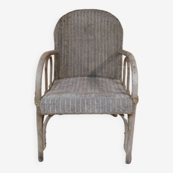 old Lloyd Loom armchair