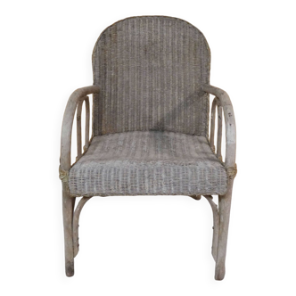 old Lloyd Loom armchair