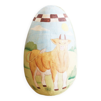 Old paper mache Easter egg with cow design