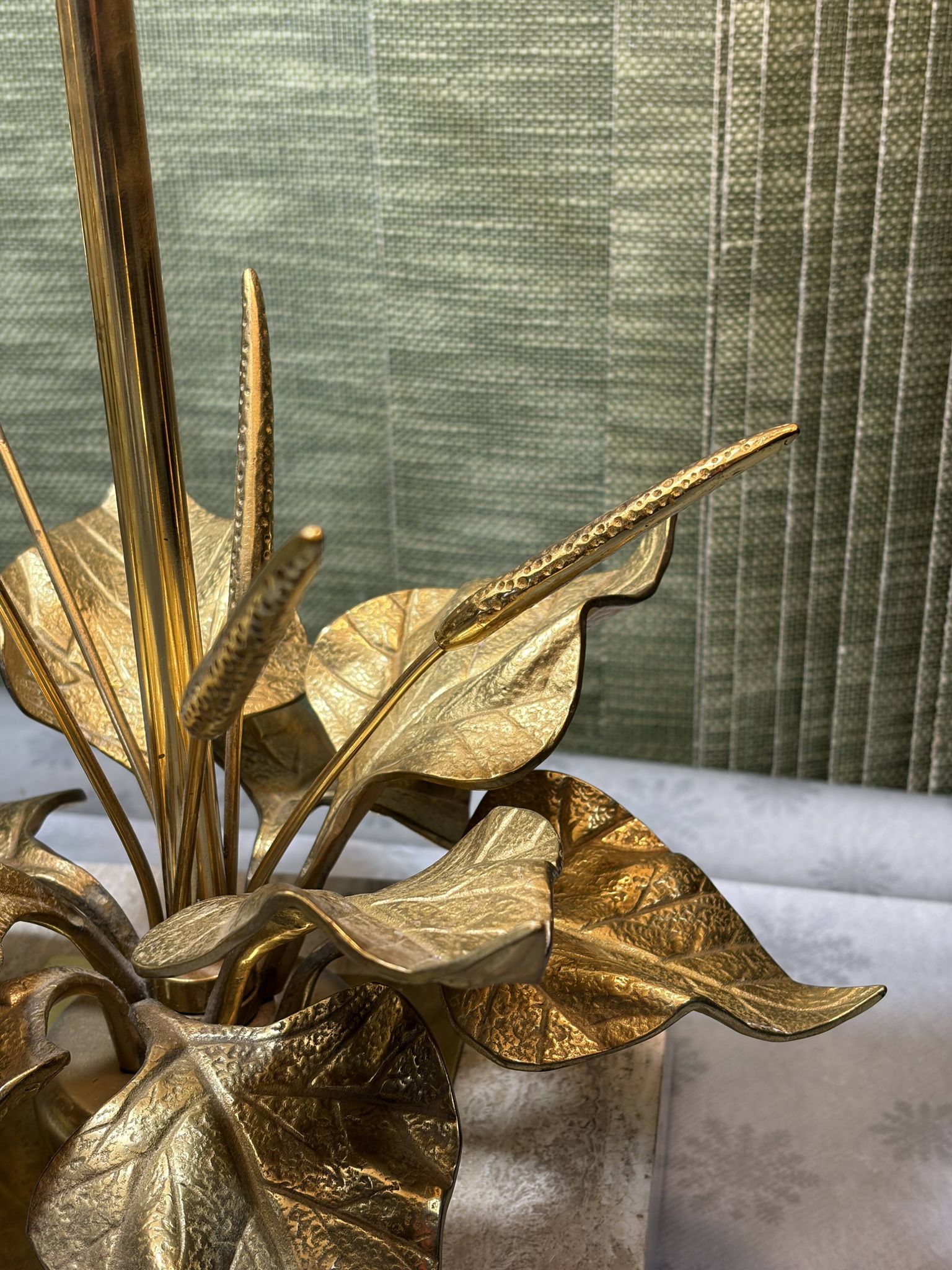 Bronze and travertine water lily lamp attributed to Maison Charles, circa 1970.