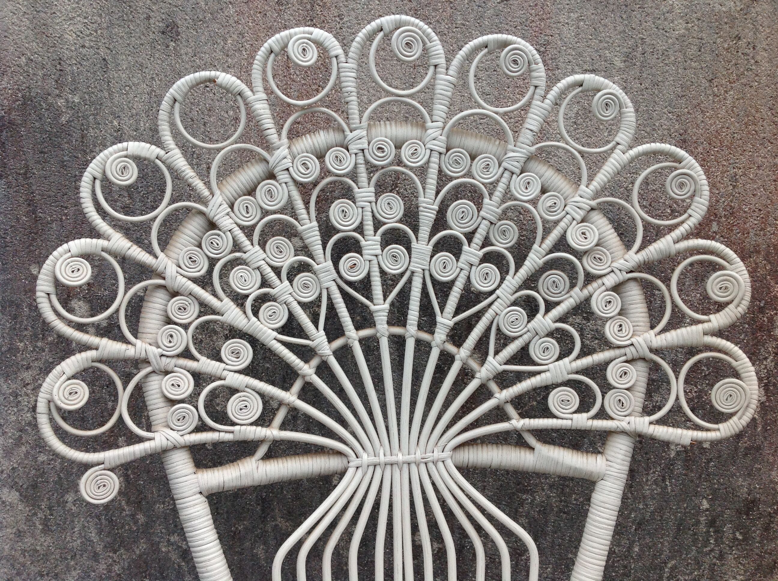 Emmanuelle-style white rattan peacock chair
