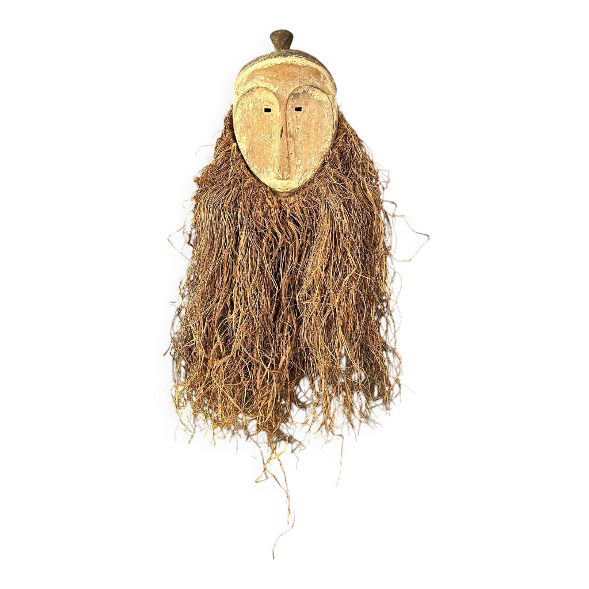 Long face tribal mask with narrow eye-holes